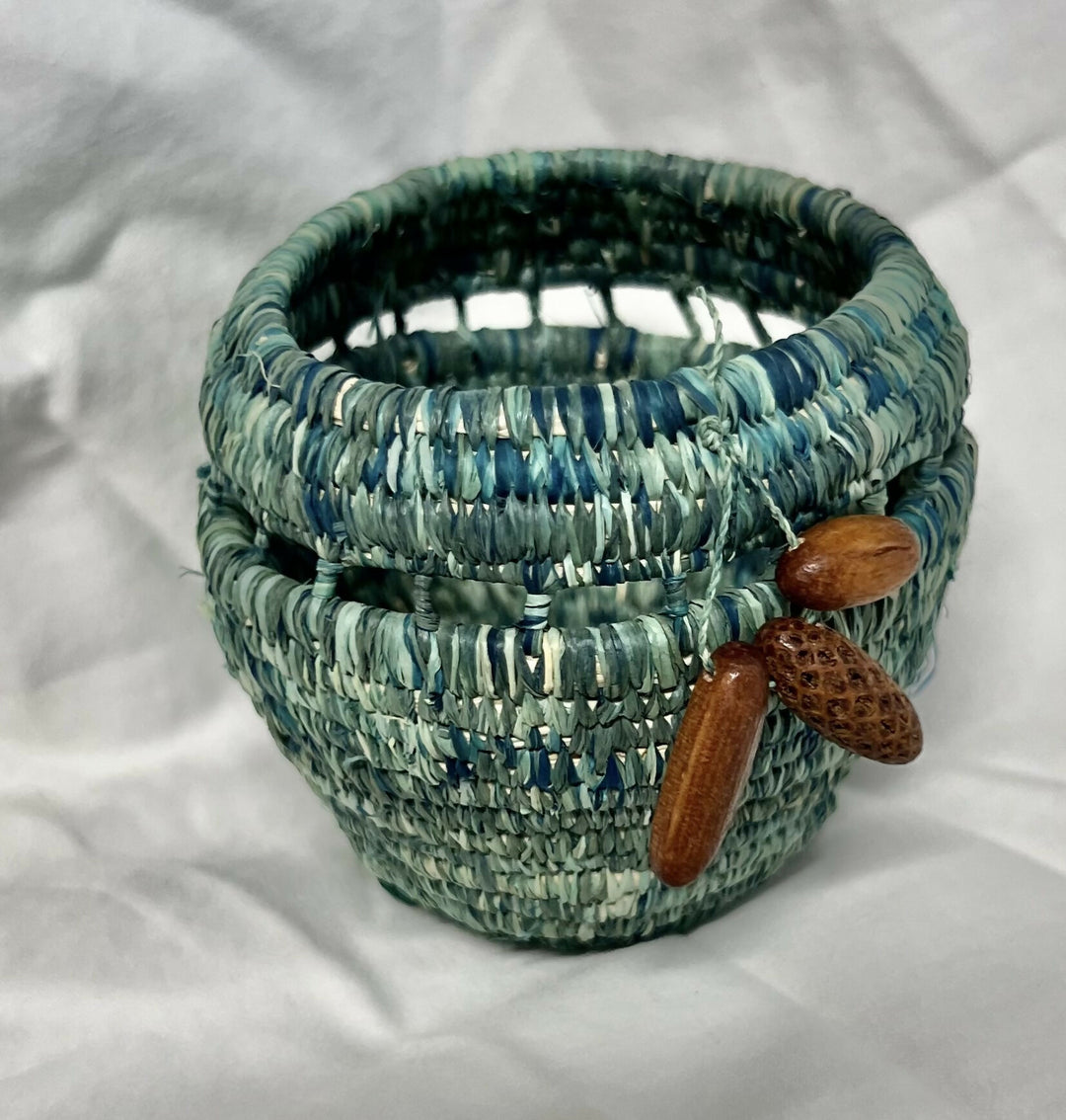 Hand woven raffia vessel