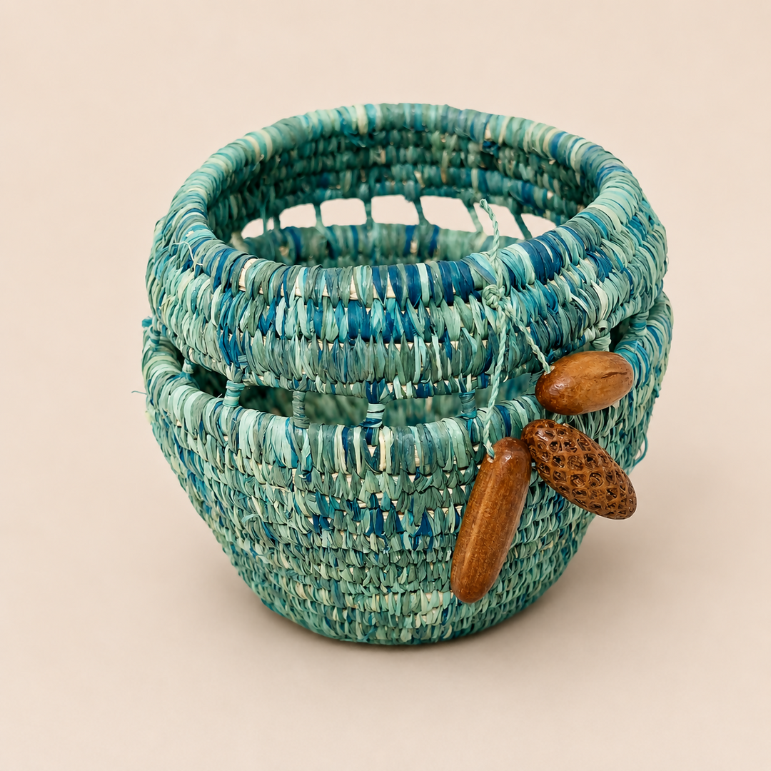 Hand woven raffia vessel